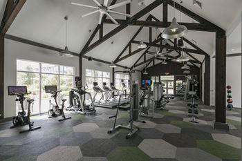 Fully-equipped fitness center with vaulted ceilings